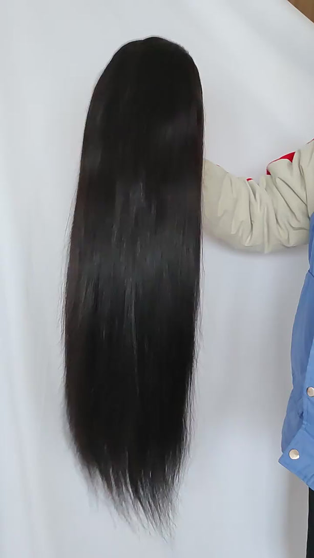 Demonstration of a Vibeme 13x4 HD lace frontal long straight human hair wig, 180% density – showcasing the smooth length from the back and flipping to reveal the inner lace cap construction.